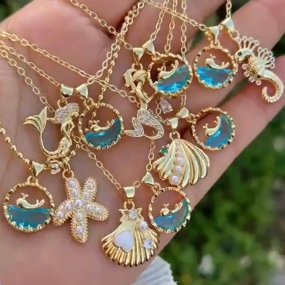 Gold and Blue Ocean-Themed Necklaces